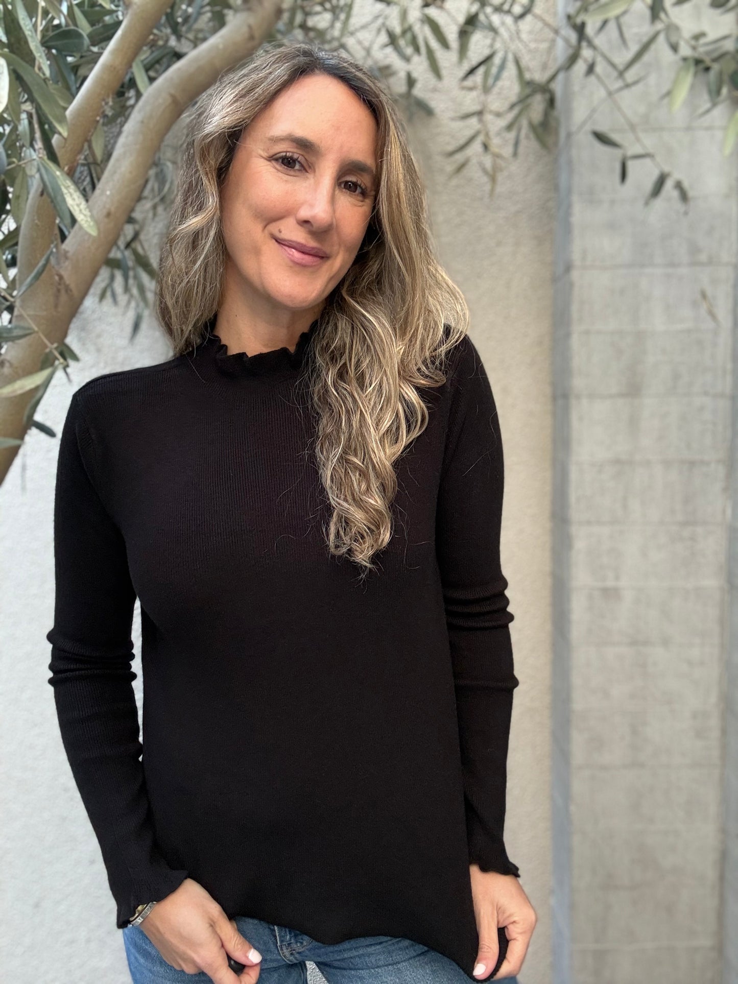 Sweater vuelitos negro